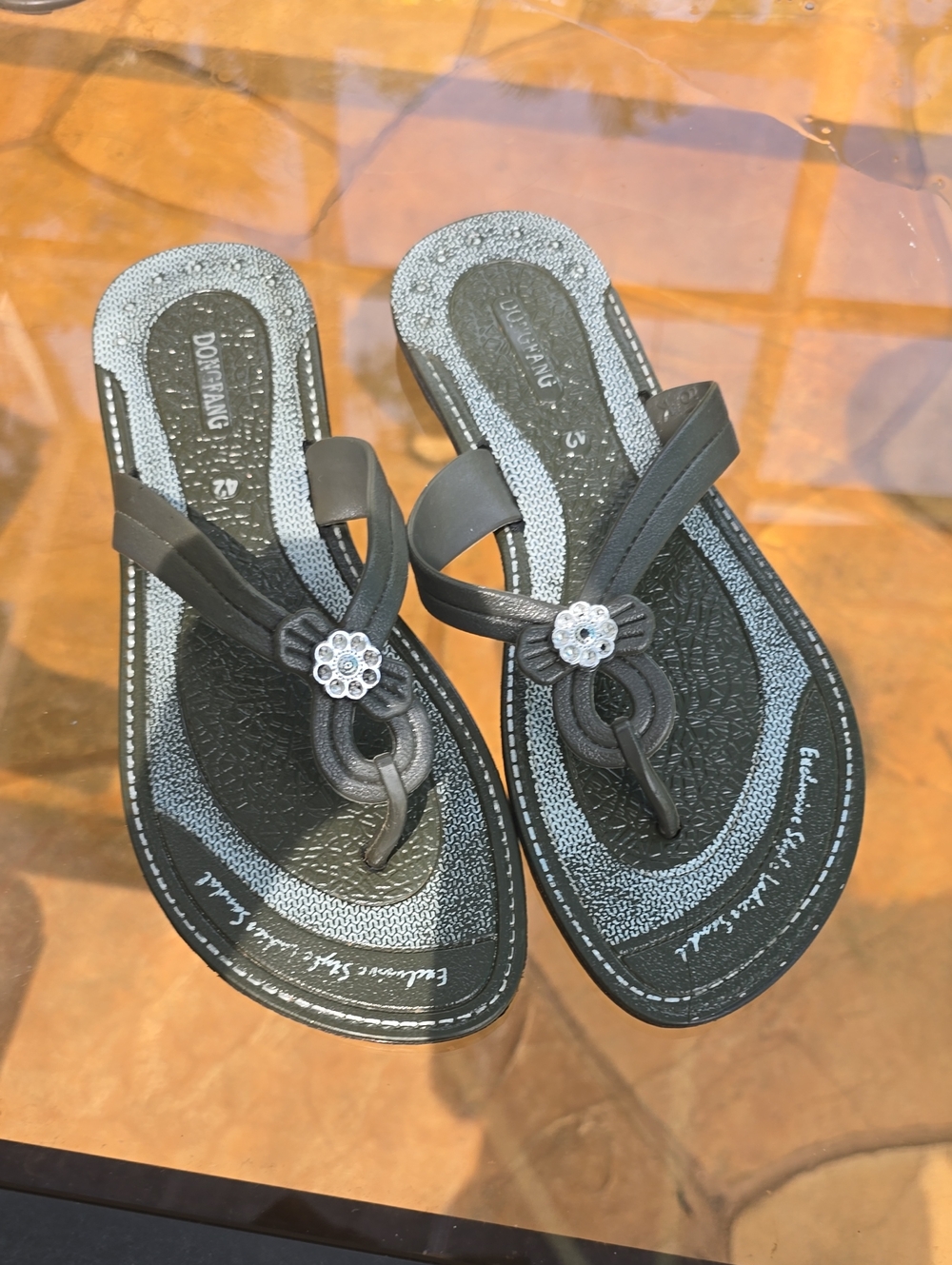 Black Floral-Accent Women's Toe-Post Sandals
